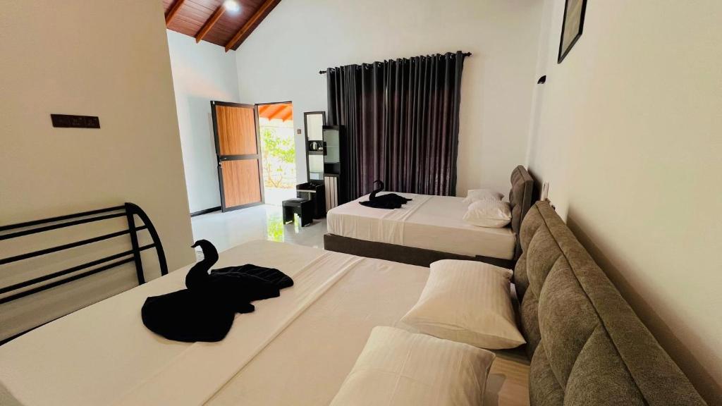 Bedroom with Swan Towel Decor